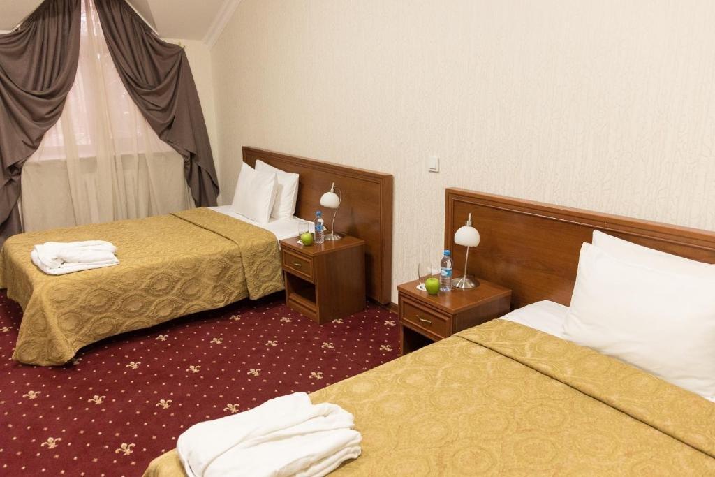 Amsterdam Hotel Aktobe Bagian luar foto